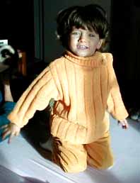 sur le lit de Papi-Mamie